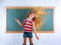 Funny student girl flipping long hair at school