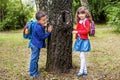 Funny students go to school. Children play in the park. The concept is back to school.