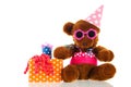 Funny stuffed bear with gifts