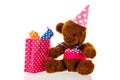 Funny stuffed bear with gifts