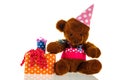 Funny stuffed bear with gifts