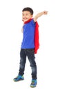 Funny superhero kid pointing and making a fist