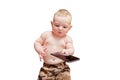 Funny surprised baby boy with a phone in his hands. Curious child hold Royalty Free Stock Photo