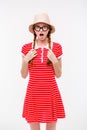 Funny surprised girl in boonie hat and round glasses Royalty Free Stock Photo