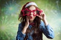 Funny surprised teenage girl in Santa hat and Royalty Free Stock Photo