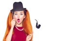 Funny teenage girl holding hat and pipe on stick