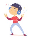 Funny teenager listening fun music, young cute guy enjoying disco dance with headphones