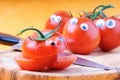 Funny tomatoes with googly eyes