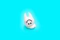 Funny tooth character isolated on blue background