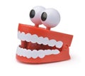 Funny toy clockwork jumping teeth with eyes