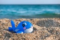 Funny toy fish at the beach Royalty Free Stock Photo