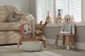 Funny toy unicorn, dog and deer in children`s room. Interior