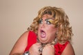 Funny travesty actor. Drag queen. Fat man and make-up. Royalty Free Stock Photo