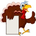 Funny turkey cartoon posing with blank sign