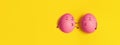 Funny two chicken eggs in love on yellow background. Natural healthy organic food. Top view, flat lay, copy space. Royalty Free Stock Photo