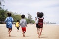 Funny vacation. Children or kids playing and romp together at the beach on holiday. Having fun after unlocking down the city from Royalty Free Stock Photo