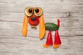 Funny vegetable spaniel made on wooden table