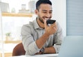 Funny voice notes are the order of the day. a young man using his cellphone at work in a modern office.