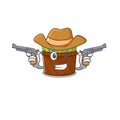 Funny watermelon fruit basket as a cowboy cartoon character holding guns Royalty Free Stock Photo