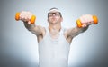 Funny weak man lifting shoulders Royalty Free Stock Photo