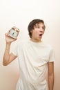 Funny white man hold mechanical alarm clock Royalty Free Stock Photo