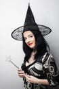 Funny Witch. Young happy woman with canival hat. Royalty Free Stock Photo