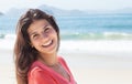 Funny woman with dark hair at beach Royalty Free Stock Photo