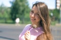 Funny woman eating a chocolate candy. Royalty Free Stock Photo