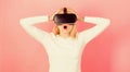 Funny woman experiencing 3D gadget technology - close up. Excited smiling businesswoman wearing virtual reality glasses Royalty Free Stock Photo