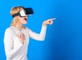 Funny woman experiencing 3D gadget technology - close up. Excited smiling businesswoman wearing virtual reality glasses