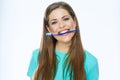 Funny woman face holding toothbrush in mouth. Royalty Free Stock Photo