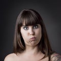 Funny woman with full cheeks Royalty Free Stock Photo