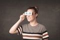Funny woman looking with hand drawn paper eyes Royalty Free Stock Photo