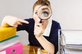 Funny woman office working secretary with magnifier Royalty Free Stock Photo