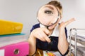 Funny woman office working secretary with magnifier Royalty Free Stock Photo