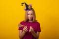 Funny young woman wearing witch costume for Halloween party. Happy Halloween witch with a black hat Royalty Free Stock Photo