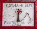 A funny wooden sign outside the general store at prudhoe bay