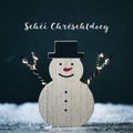 Snowman and text merry christmas in luxembourgish