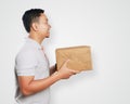 Funny Young Asian Courier Guy Giving Package Box