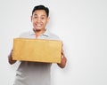 Funny Young Asian Courier Guy Giving Package Box