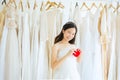 Funny young bride asian woman happy and smiling with model heart red color Royalty Free Stock Photo