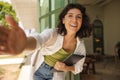 Funny young caucasian girl with laptop smiling taking selfie outdoors. Royalty Free Stock Photo