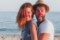 Funny young couple in love on the beach Royalty Free Stock Photo