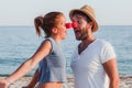 Funny young couple in love on the beach Royalty Free Stock Photo