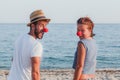 Funny young couple in love on the beach Royalty Free Stock Photo
