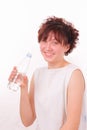 Funny young girl with a bottle of mineral water Royalty Free Stock Photo