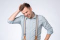Funny young man hold his head in hand forgotten something Royalty Free Stock Photo