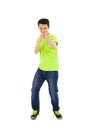 Funny young man make a hand gun gesture Royalty Free Stock Photo