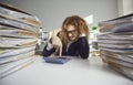 Funny young weird man accountant financial worker counting on calculator Royalty Free Stock Photo