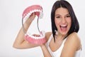 Funny young woman with jaws Royalty Free Stock Photo